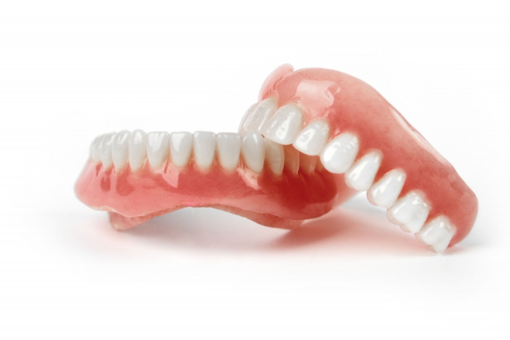 All-on-4 overdenture that clicks onto four dental implants